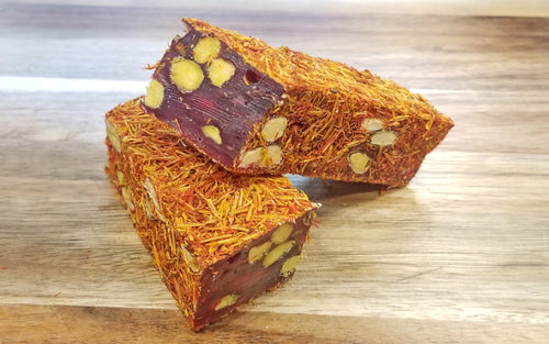 SUJUK WITH PISTACHIOS AND POMEGRANTE FLAVOR COATED WITH SAFFLOWER by Paris Pastry in Michigan USA
